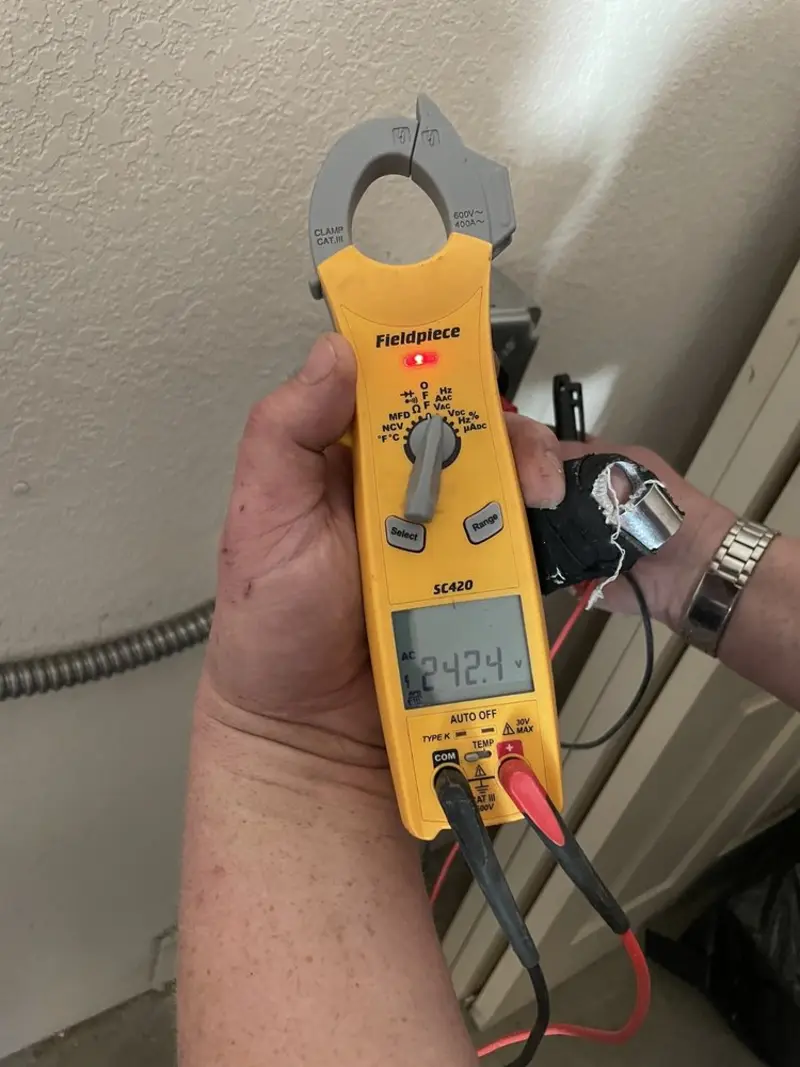 Voltage testing with clamp meter during Circuit Breaker Repair in Sutton